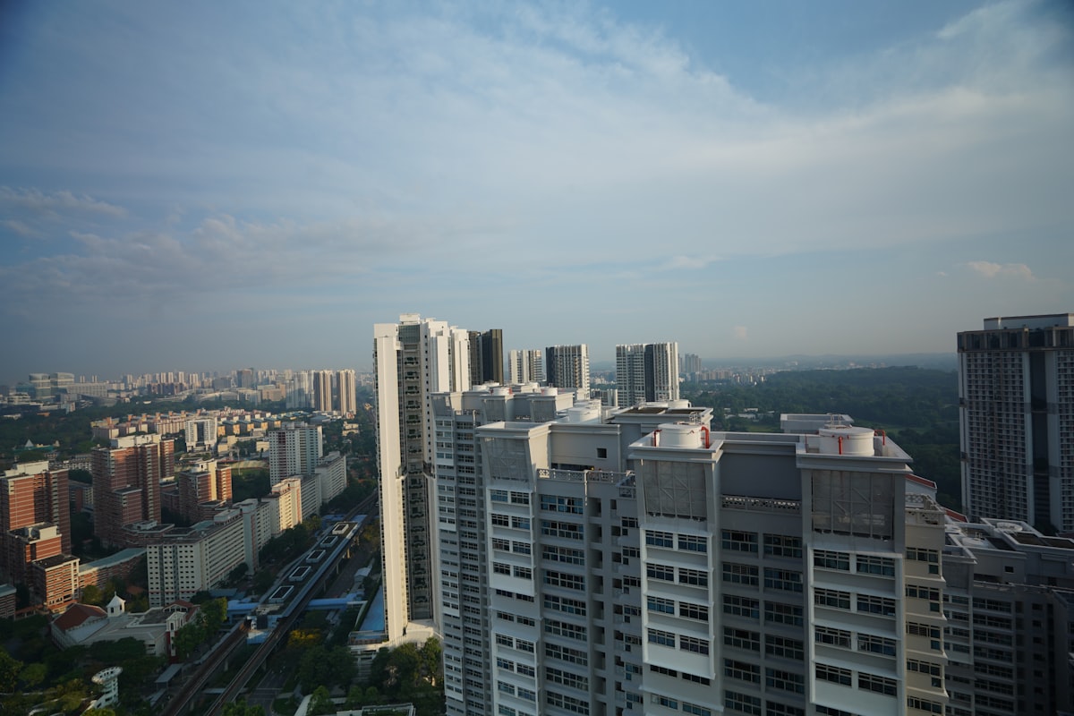 Panoramic view of modern HDB towers across a Singapore housing estate