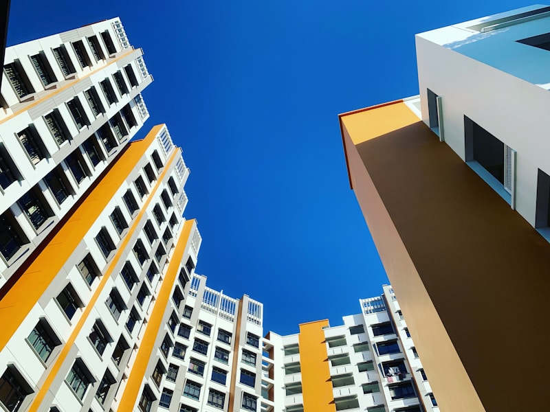 High-rise HDB apartment building in Singapore against a clear sky