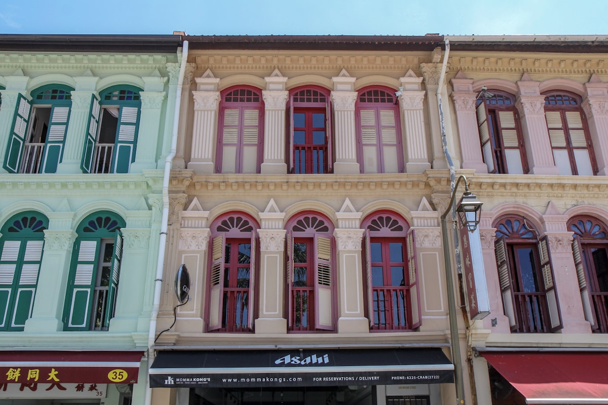 Colourful row of Singapore shophouses with colonial architectural facades
