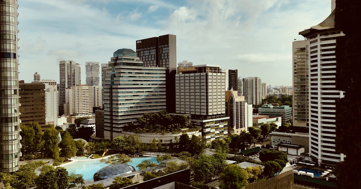 Singapore District 10 luxury residential towers with pool and greenery near Orchard Road
